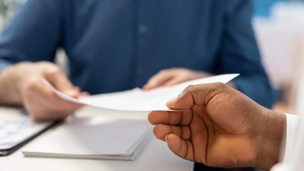 Employee discussing severance negotiation strategy with experienced employment lawyer.